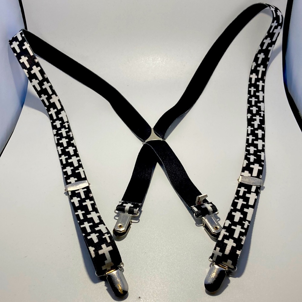 Got his suspenders black and whit cross